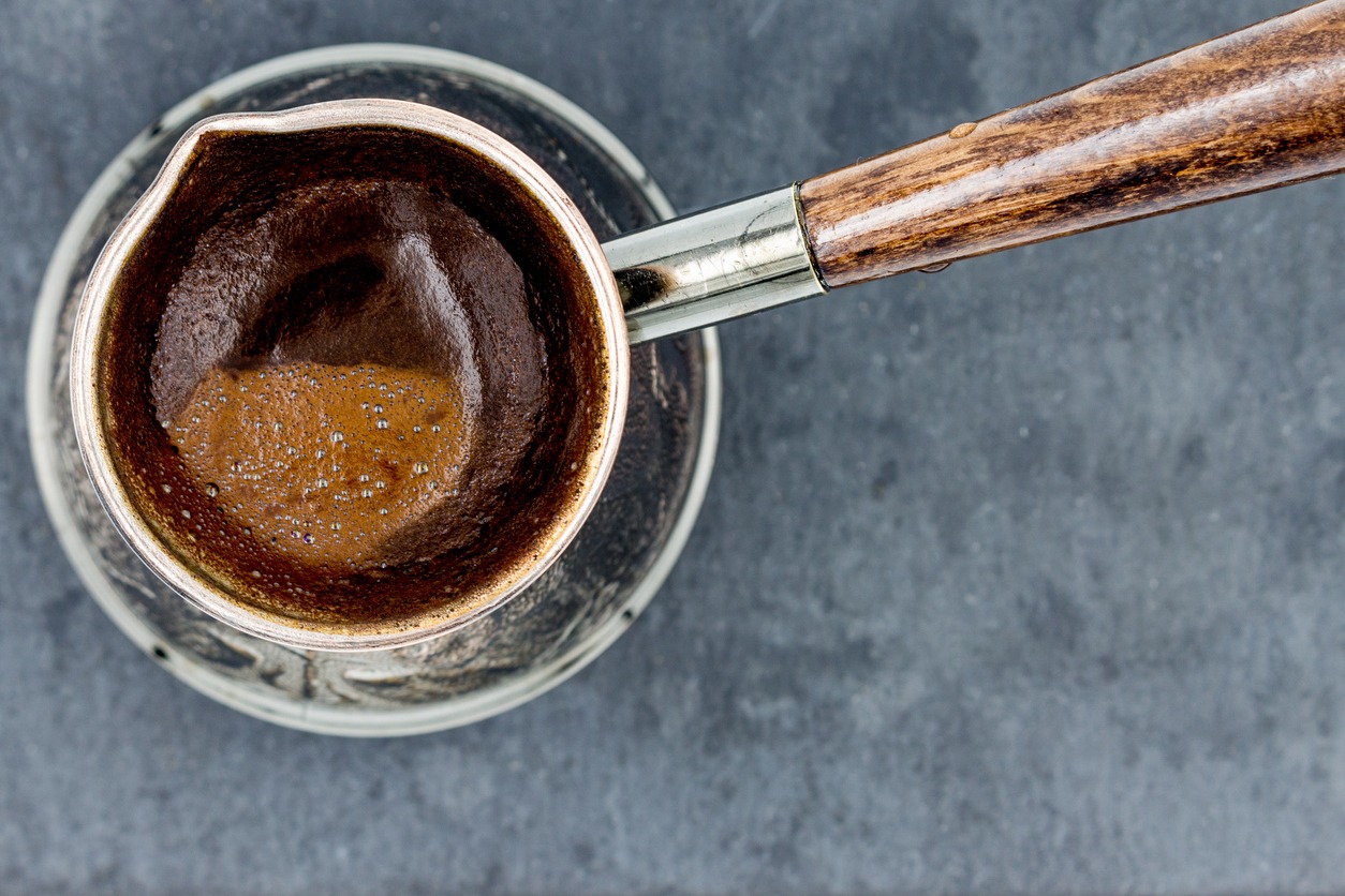 A closeup image of a Jazzve pot with brewed coffee