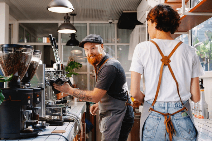 barista making some coffee