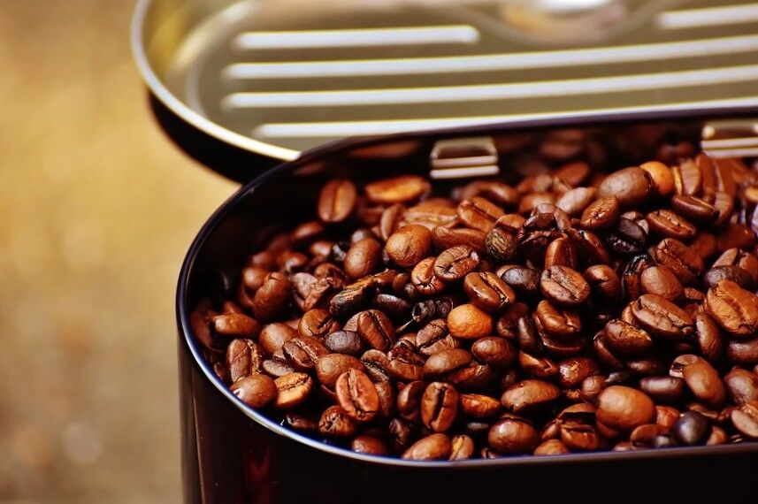coffee beans in a tin container
