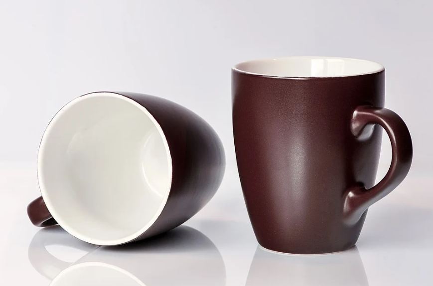 A rainbow out of baked clay could suit very well even on the dark-colored mugs