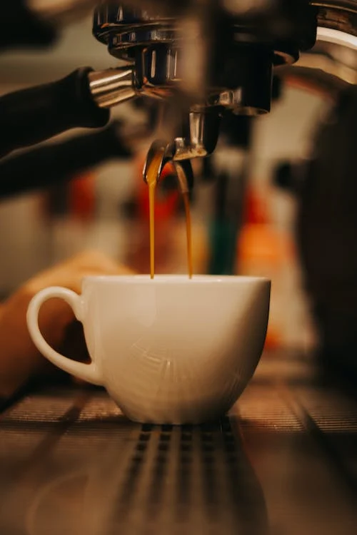 coffee machine pouring coffee