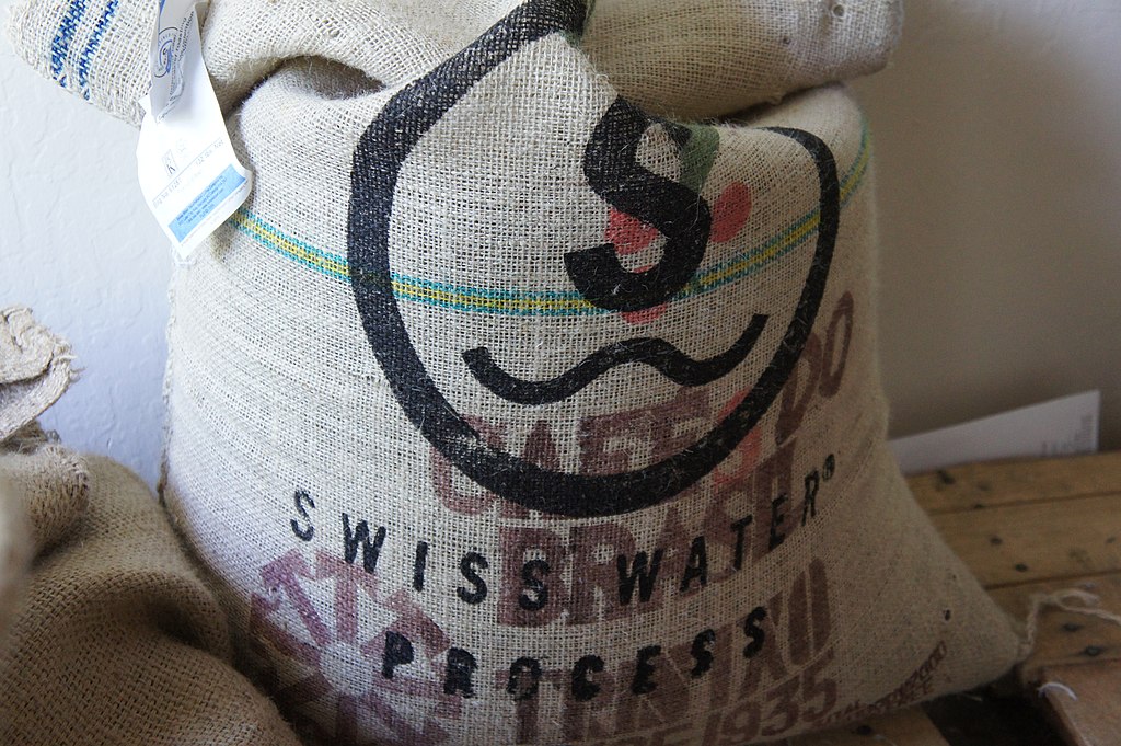 A sack of decaffeinated beans labelled with “Swiss Water”